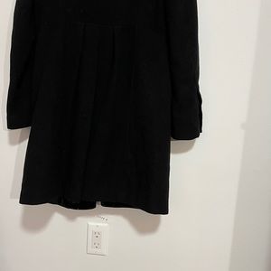 DKNY Coat black color and it is easy to style with